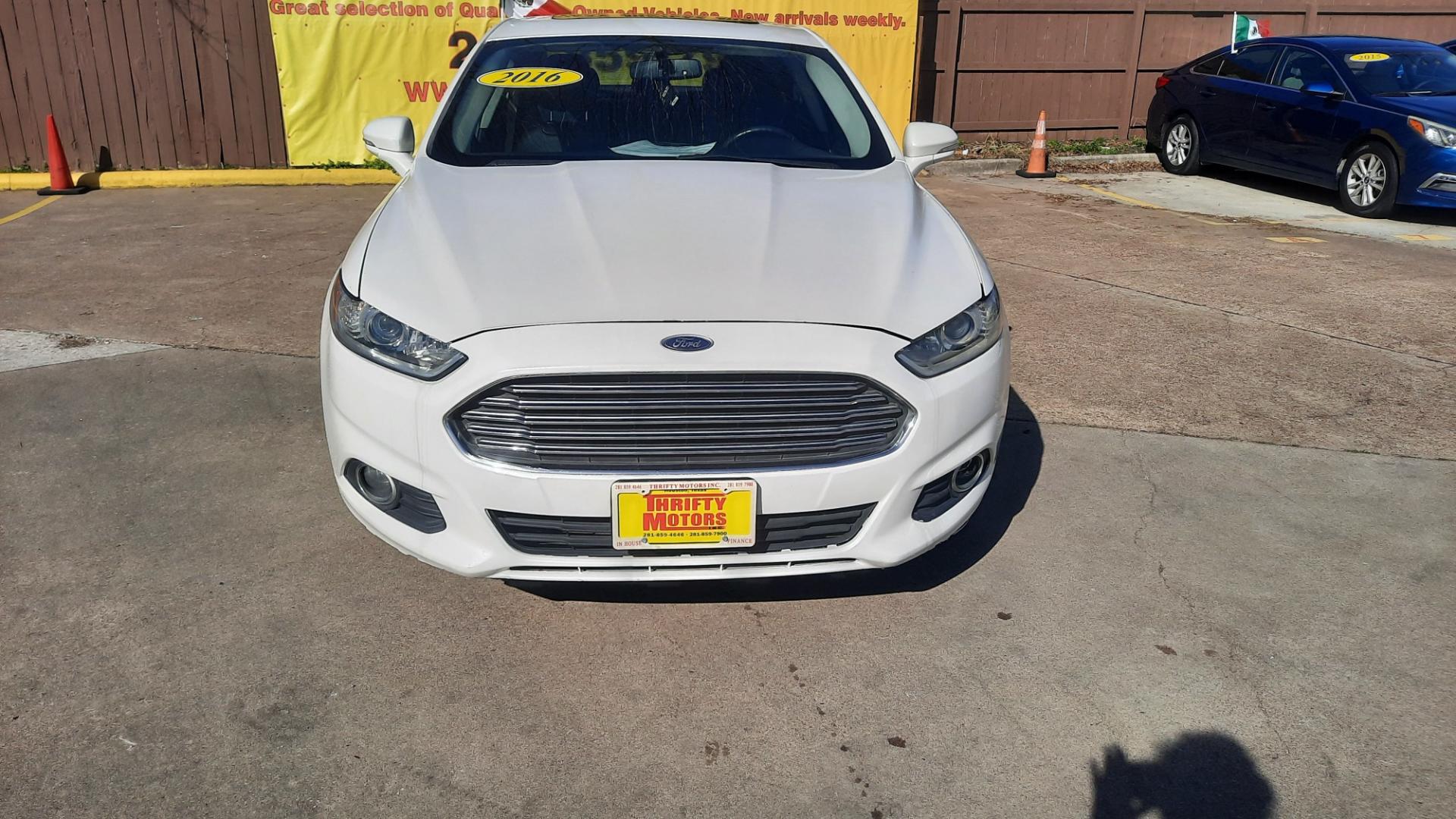 2016 Ford Fusion (3FA6P0HDXGR) , located at 16710 Clay Rd., Houston, TX, 77084, (281) 859-7900, 29.834864, -95.656166 - Photo#0